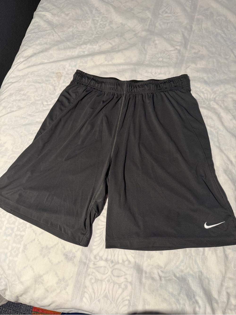 Nike Men’s grey Athletic Shorts with White Swoosh